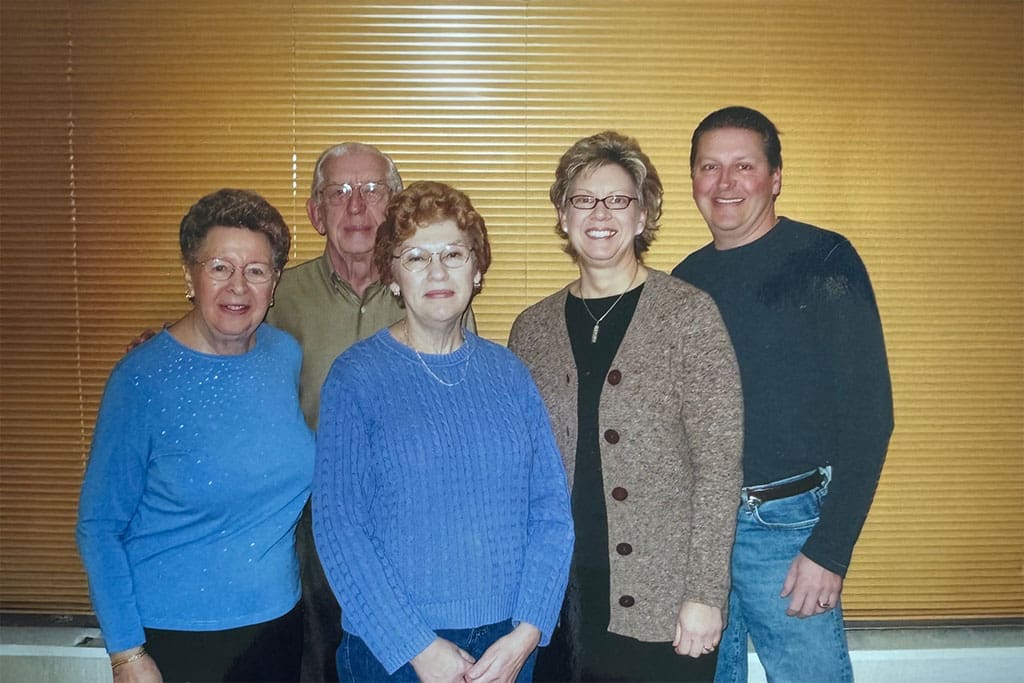 Peoples standing in front of a wall