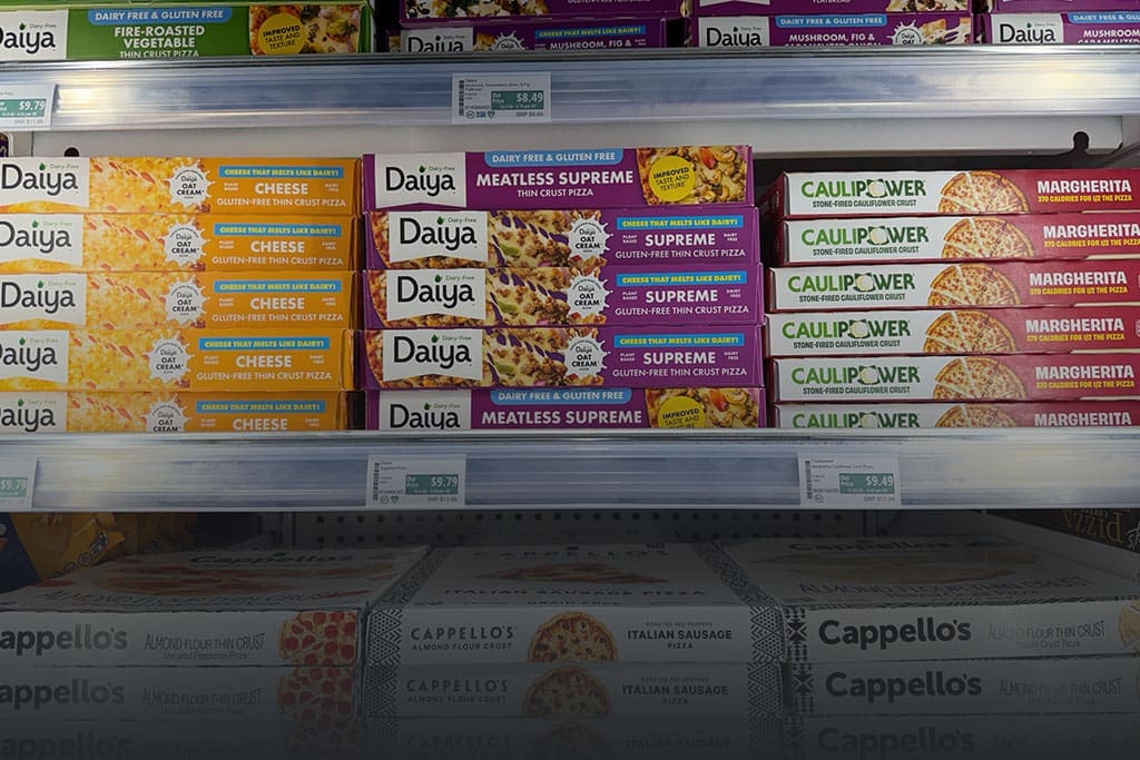 Shelf of frozen pizza